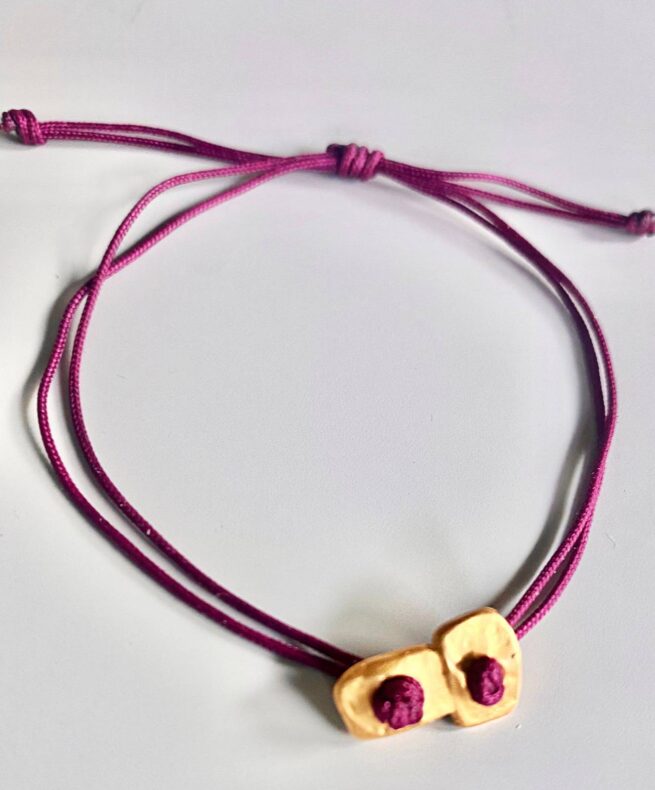 Pulsera solidaria menudos corazones